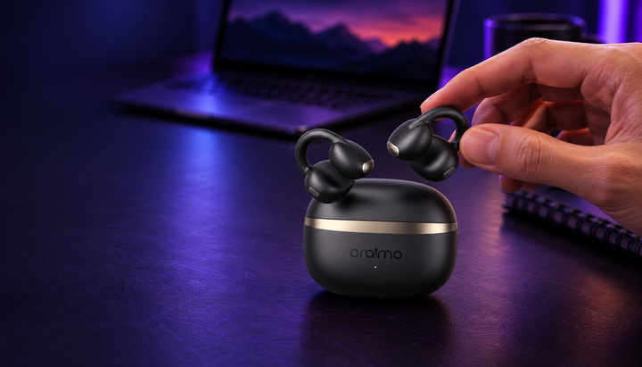 Illustrative lifestyle scene of Oraimo OpenSnap earbuds on a purple-lit desk